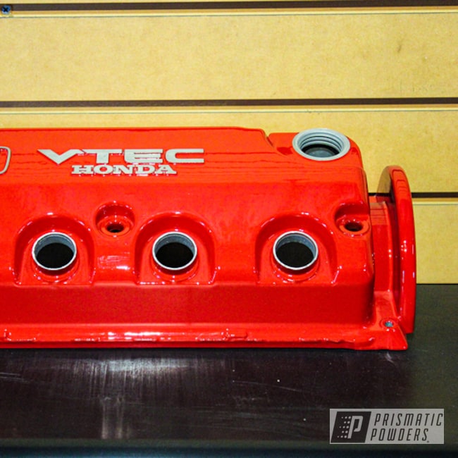 Honda Civic Valve Cover coated in a Red Finish | Prismatic Powders