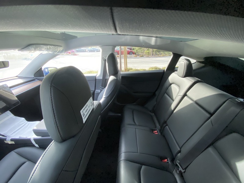 Tesla Model Y Interior Pictures Surface, as Truckloads Show First